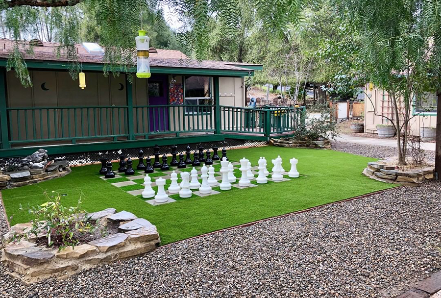 Artificial turf, giant chess board.