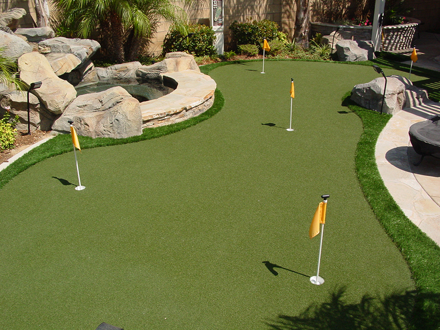 Synthetic turf putting green with 4 holes.